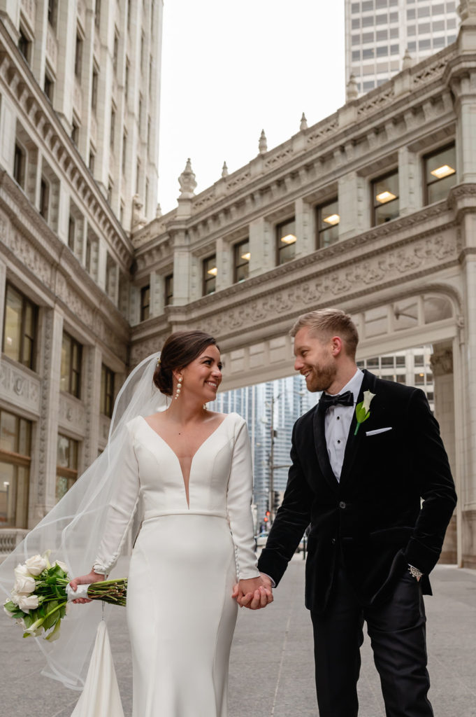 Bride and groom at the Wrigley Building in Chicago