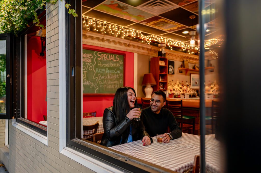 A couple enjoys a drink at  Guthrie's Bar in Chicago.